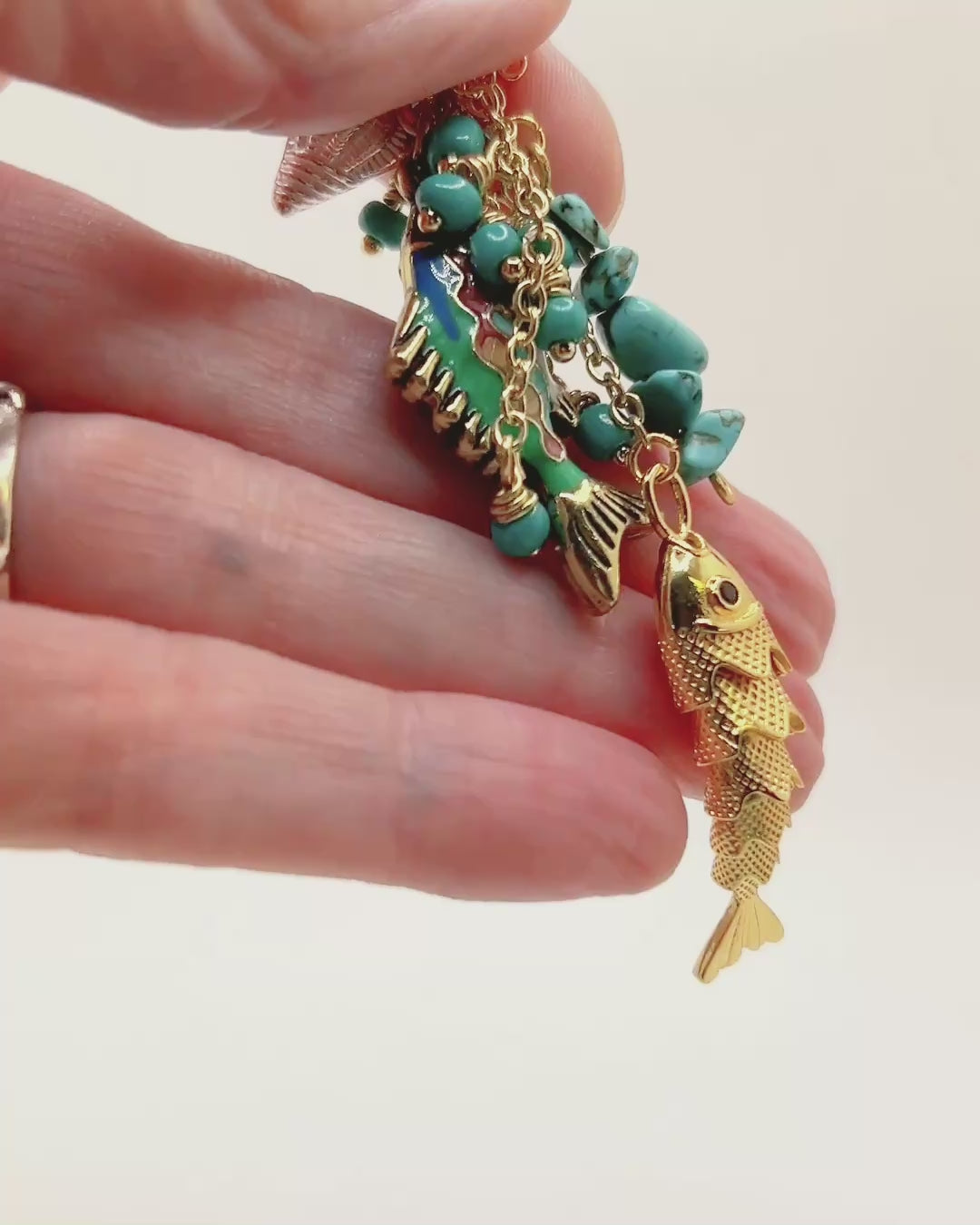 Load video: Turquoise Fish Charm Dangle Earrings